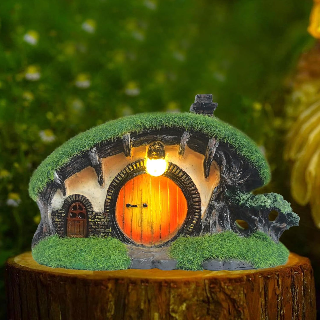 Solar garden lights illuminating a beautiful outdoor garden at dusk